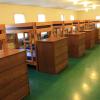 Six bunk beds line the wall in a bunk room in Maple Lodge.