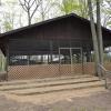 Red Pine Pavilion exterior, featuring wooden steps.