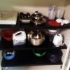 Pots, pans, and blenders on a shelf in Tamarack Lodge.