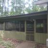 Large screened-in porch at White Pine Lodge.